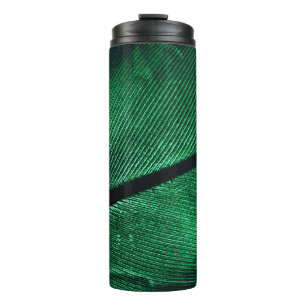 Groene veer, mooie patroontextuur. thermosbeker
