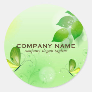 Groene voorjaarsachtergrond met vlinder ronde sticker