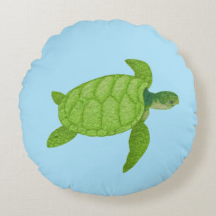Groene zeeschildpad op turquoise achtergrond rond kussen