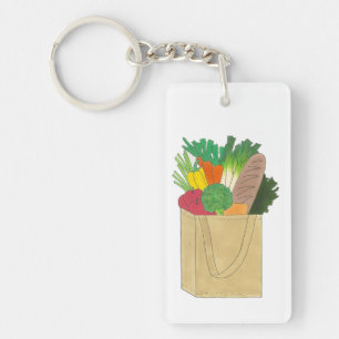 Grokershopping op de markt voor groenten en fruit sleutelhanger
