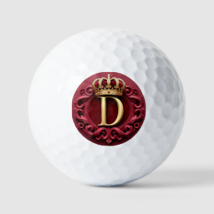 Groot D-monogram op rode fluwelen achtergrond Golfballen