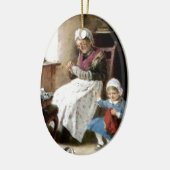 Grootmoeder en kleindochter naaien keramisch ornament (Links)