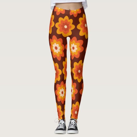 Groovy retro 70s boho hippie oranje bloempatroon leggings (Voorkant)