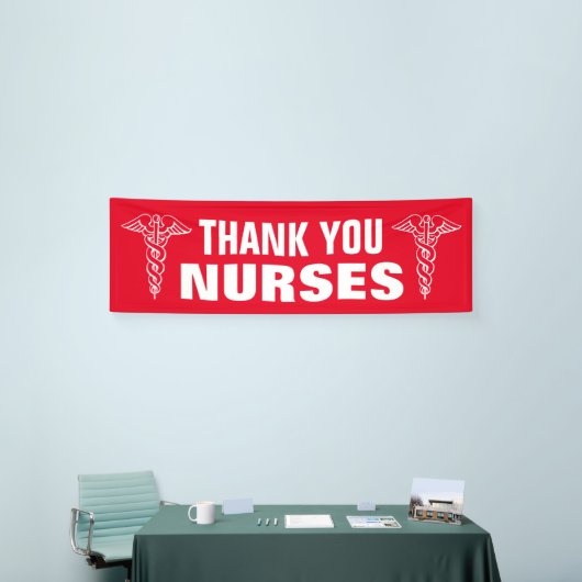 Grote dank u teken voor verpleegkundigen met caduc spandoek (Beurs)