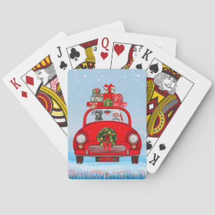 Grote deen-hond in de auto met de kerstman pokerkaarten