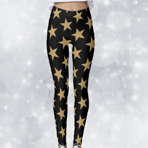 Grote gouden kerststerren op zwart leggings