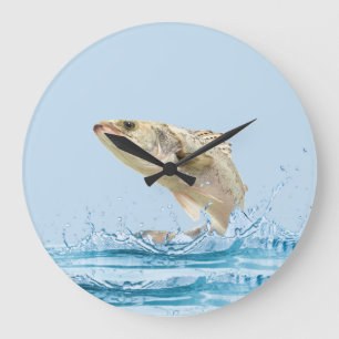 grote vis die uit het water springt grote klok