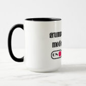 Grumpy mode op mok met gefrituurde kattenkoffie (Links)