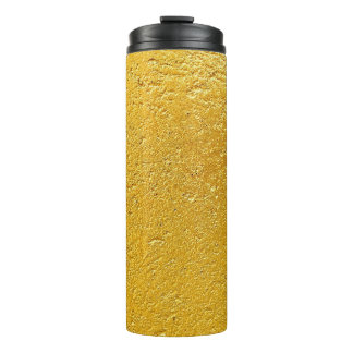 Grunge goud of folie achtergrond en textureabstrac thermosbeker
