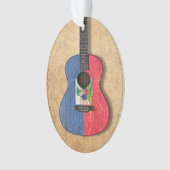 Guitare acoustique âgée et utilisée de drapeau (devant)