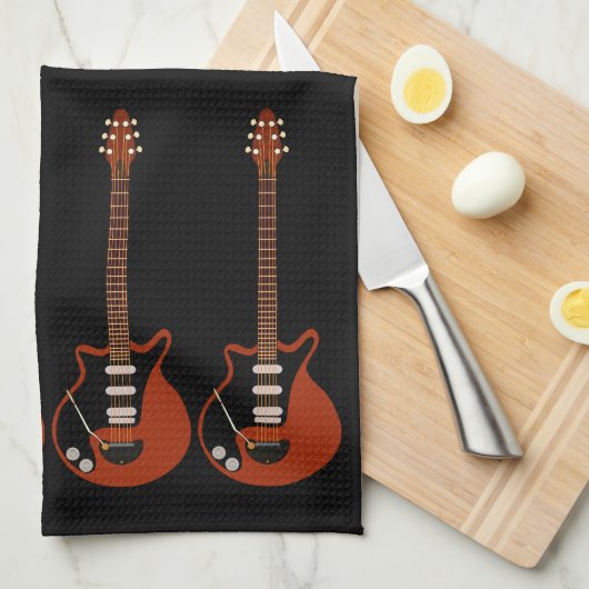 Guitares électriques sur serviette noire (Quart Plié)