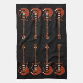 Guitares électriques sur serviette noire (Vertical)