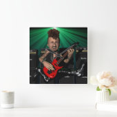 Guitariste en vol Carré horloge murale (Maison)