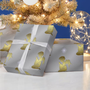 Gulden kerstangels op zilver cadeaupapier