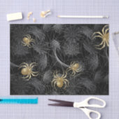 Gulden spinnen op zwart papier (Craft)