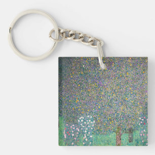 Gustav Klimt - Rosebushes onder de bomen Sleutelhanger