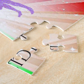 "GYMNASTICS" éclaire le puzzle avec la gymnaste. (Côté)