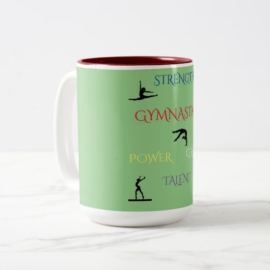 GYMNASTICS TWEE TELEFOONMOK IN SAGE/MAROON. TWEEKLEURIGE KOFFIEMOK (Voorkant links)