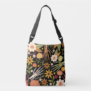 Halloween botten, bloemennaadloos patroon. crossbody tas