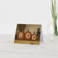Halloween heureux huent la carte de citrouille