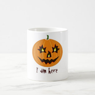 halloween pompoen met kaarsen erin koffiemok