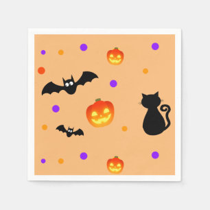 Halloween pompoenen, vleermuizen en kat op wit servet