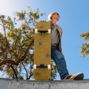 Halloween spiders web and pumpkins skateboard