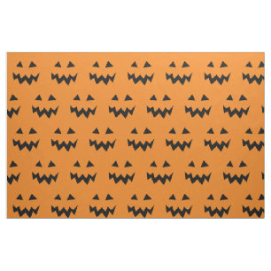 Halloween stof met een patroon met geslepen pompoe