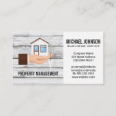 Hand die huislogo vasthoudt visitekaartje (Voorkant)