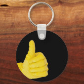 hand in gele latexhandschoen sleutelhanger (Voorkant)