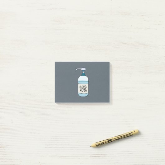 Handbeenderer met 70% alcohol post-it® notes (Op bureau)