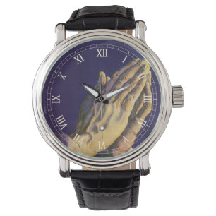 handen die bidden met de ster van Bethlehem Horloge