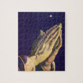 handen die bidden met de ster van Bethlehem Legpuzzel (Verticaal)