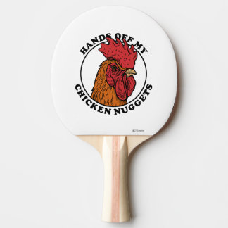 Handen van mijn kipnuggets tafeltennisbatje