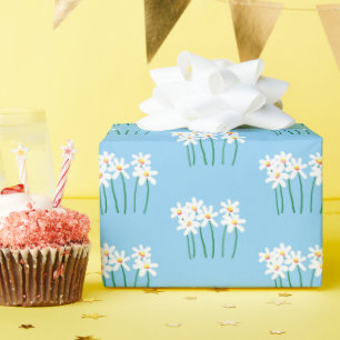 Handgetekende zoete witte madeliefjes op zacht mid cadeaupapier