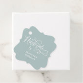 handmade whimsical script monogram product label (In situ)