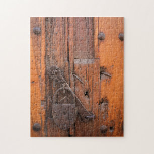 Hangslot op houten deur legpuzzel