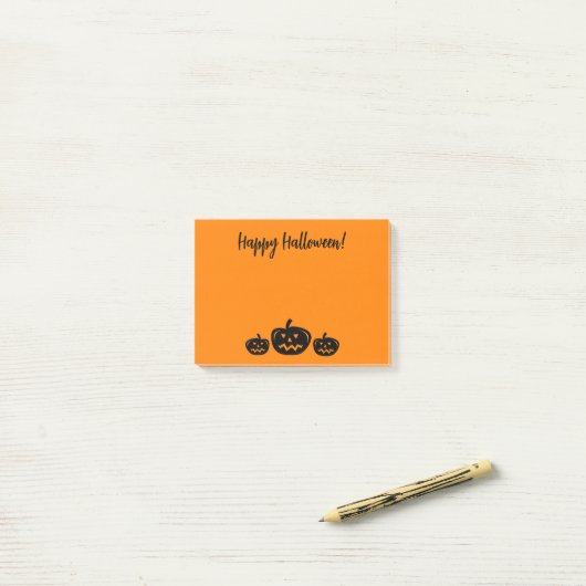 Happy Halloween orange Post-it® notes avec citroui (Sur un bureau)