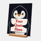 Happy penguin holding a sign to personalize (Angle)