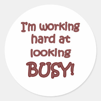 Hard werken aan druk kijken ronde sticker