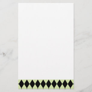 Harlekijnmunt en zwart briefpapier