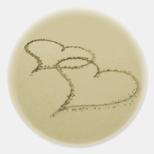 Harten in het zand ronde sticker (Voorkant)