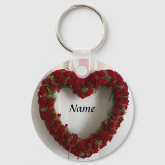 Hartvormige bloemenkrans met rode rozen sleutelhanger