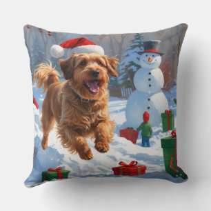 Havanese hardloop in sneeuw met kerstmuts kussen