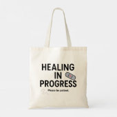 Healing in uitvoering – Canvas tas (Achterkant)