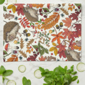 Hedgehogs and autumn forest flora on ivory theedoek (Gevouwen)