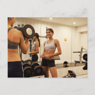 Hefgewichten in de gym briefkaart