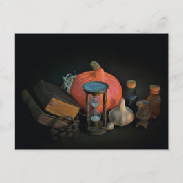Hekserijobjecten op een tafel in een donkere kamer briefkaart