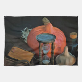 Hekserijobjecten op een tafel in een donkere kamer theedoek