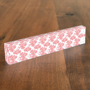 Helder rood en roze bloemeninpakpapier naambordje